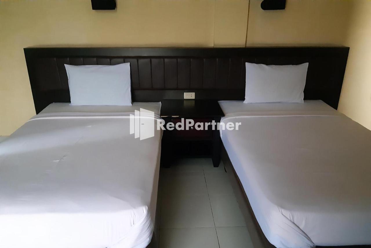 Carolina Transit Hotel Medan Bagian luar foto